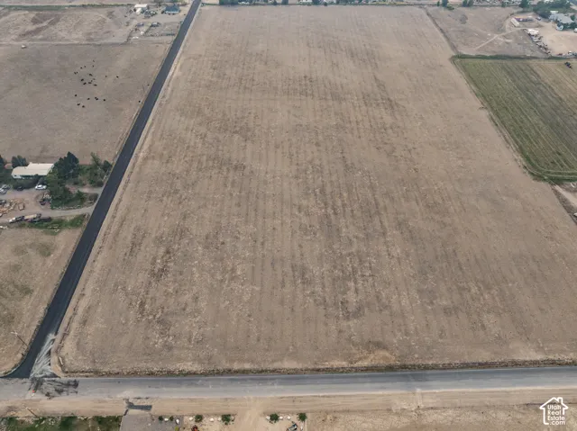 Expansive agricultural land featuring a level terrain and clear boundaries