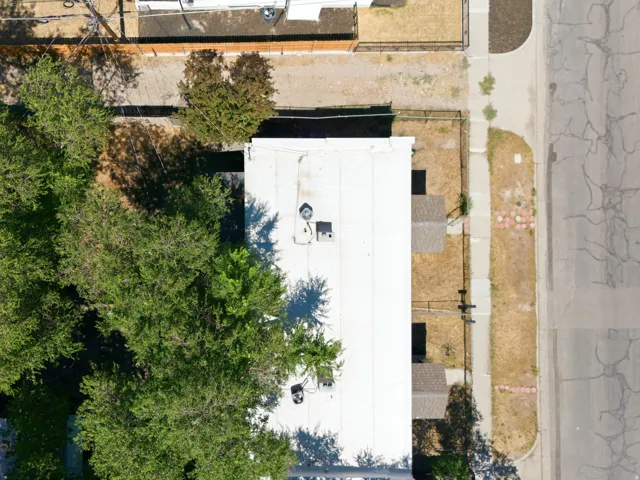 White flat roof with multiple HVAC units