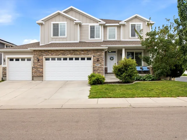 Beautiful home with SOLAR PANELS, a dedicated HOME THEATER, a 4-CAR GARAGE, and NO HOA!