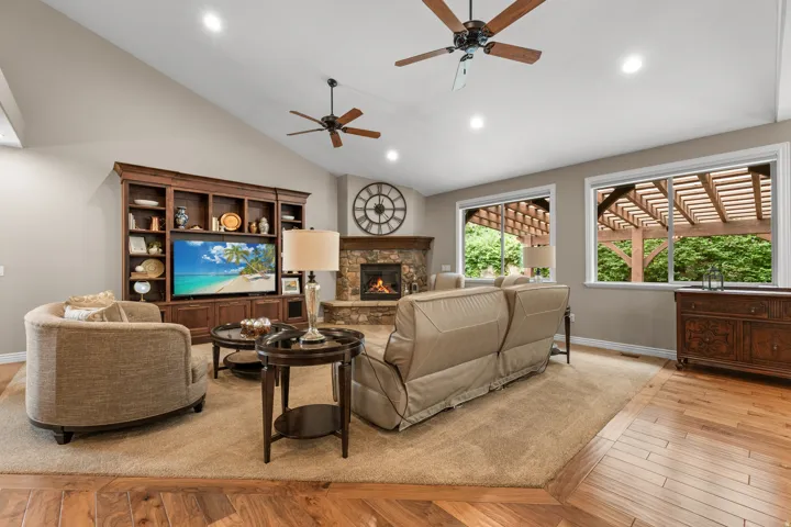 Vaulted ceilings with recessed lighting and ceiling fans