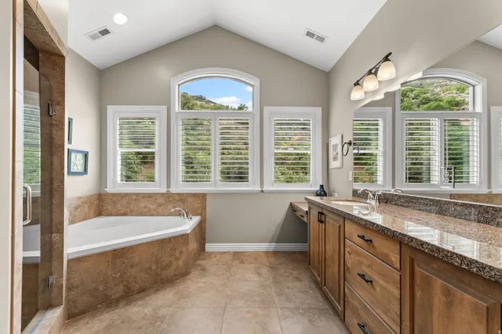 Vaulted ceiling with an arched window