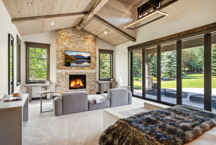 Vaulted wood-paneled ceiling with exposed beams