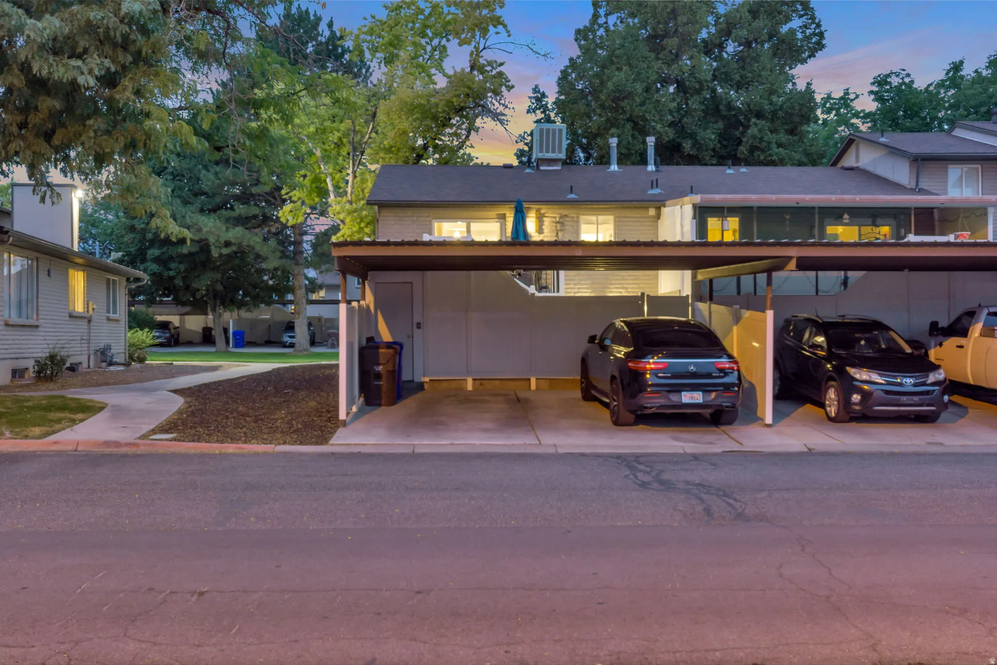 Covered carport parking for two vehicles
