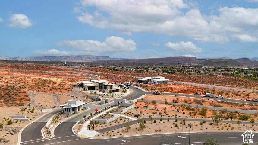 Newly constructed structures, paved roadways, and desert landscaping