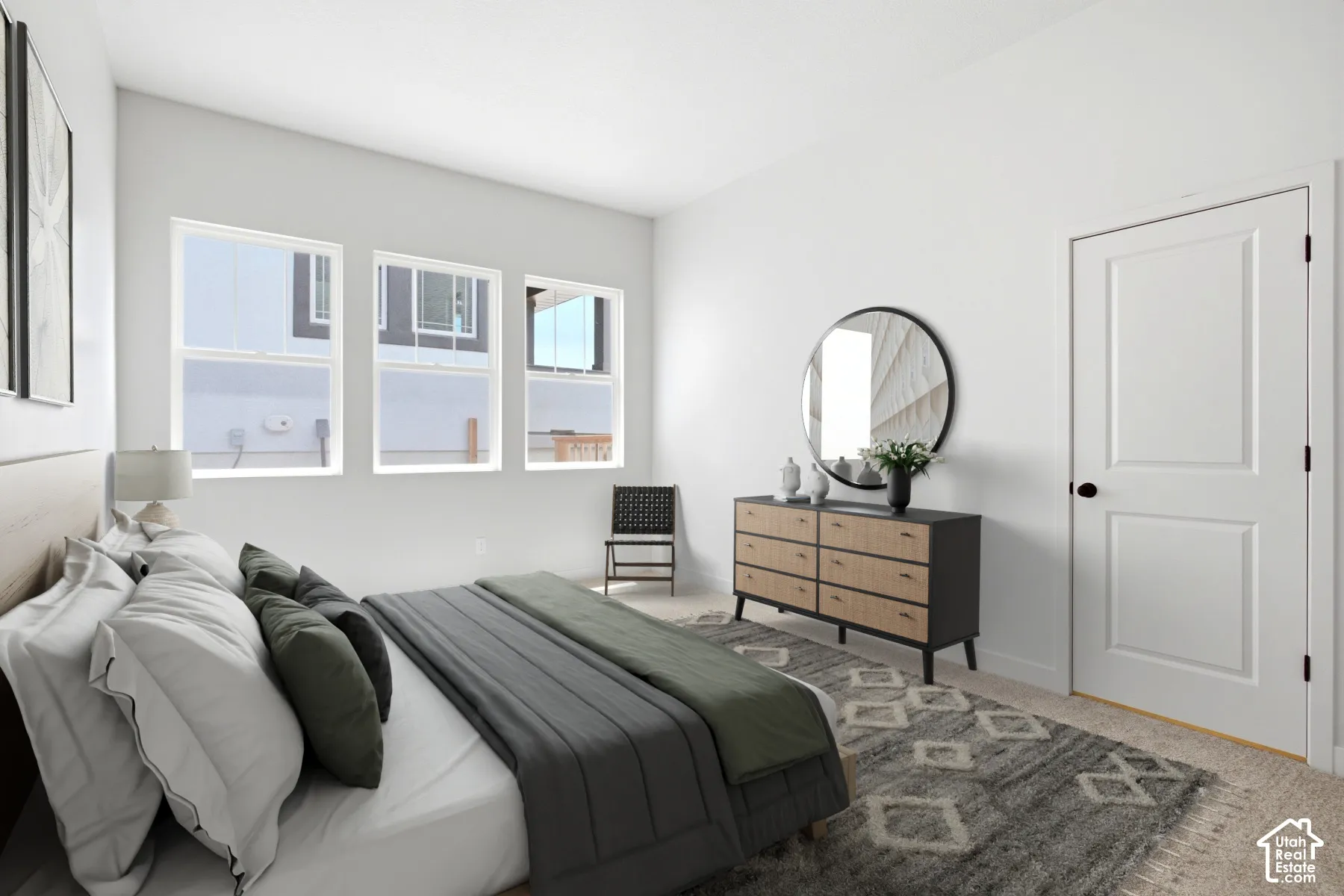 Three large windows provide natural light