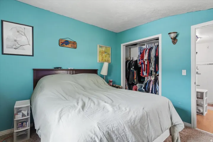 Built-in closet with shelving and hanging rods
