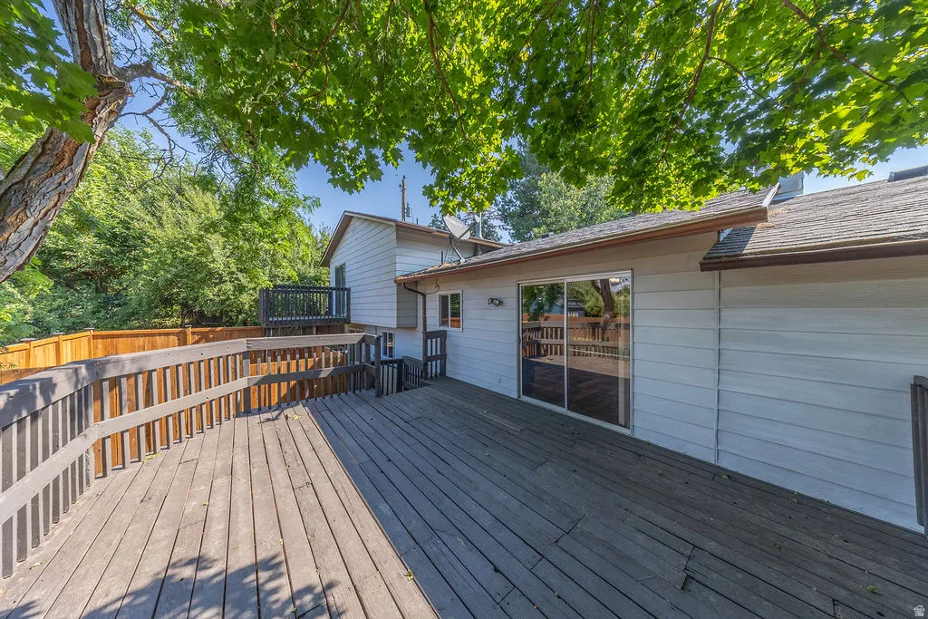 Expansive outdoor decking with wood railings