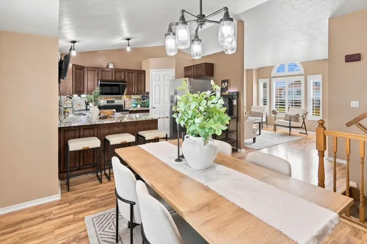 Vaulted ceilings in dining and kitchen spaces.  Open concept.