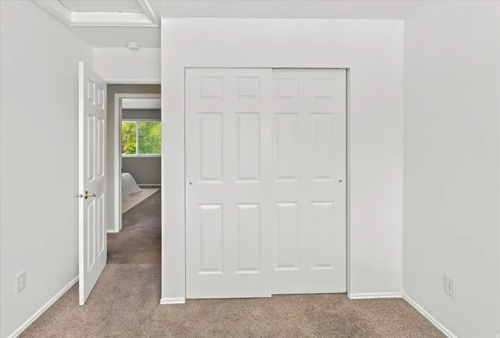 Bedroom #2 view toward closet and door