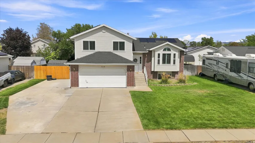 So close to Hill AFB.  Multi-level home.   Spacious.  RV parking.