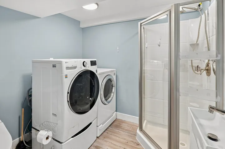 Basement  bathroom and laundry.  Washer and dryer stay.