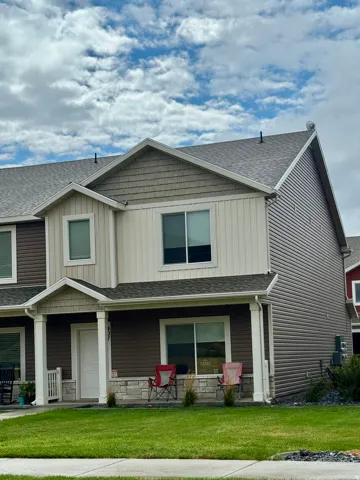 Two-story exterior with horizontal and vertical siding