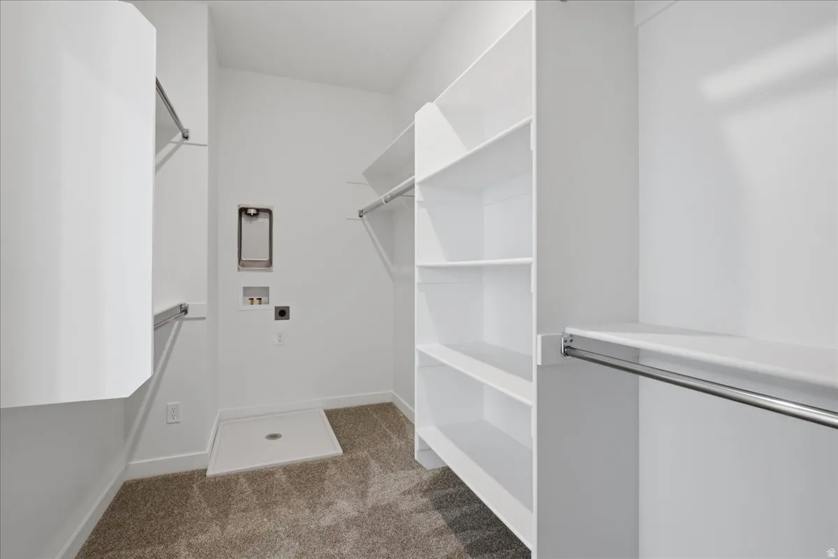 Extra Large Primary Closet with a secondary stackable laundry hook-up!