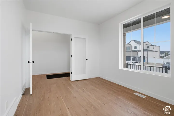 Office with double doors and large windows. Perfect for remote work.