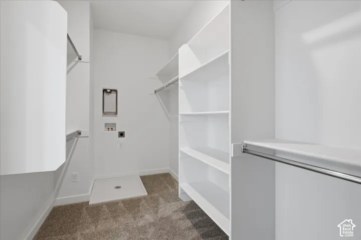 Extra Large Primary Closet with a secondary stackable laundry hook-up!
