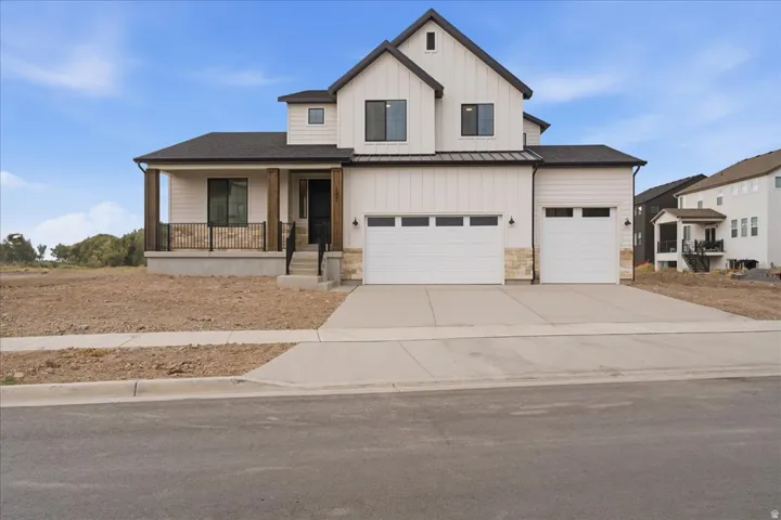 Maple Plan with no back yard neighbors. 9' 3 Car Garage