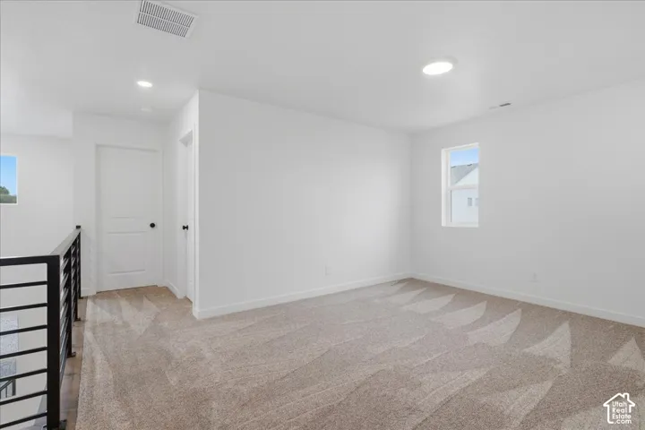 View of Loft w/ Modern Metal Railing