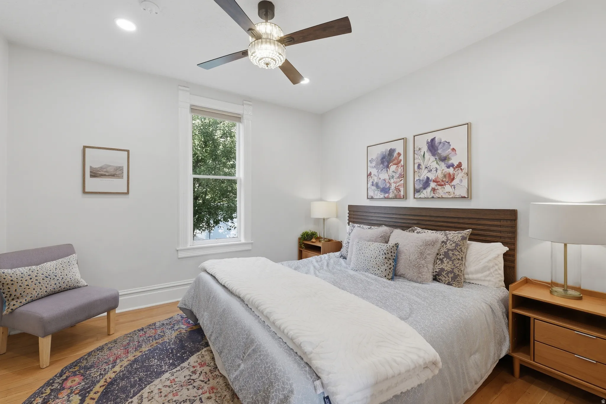 Hardwood flooring, recessed lighting, and a ceiling fan with light fixture