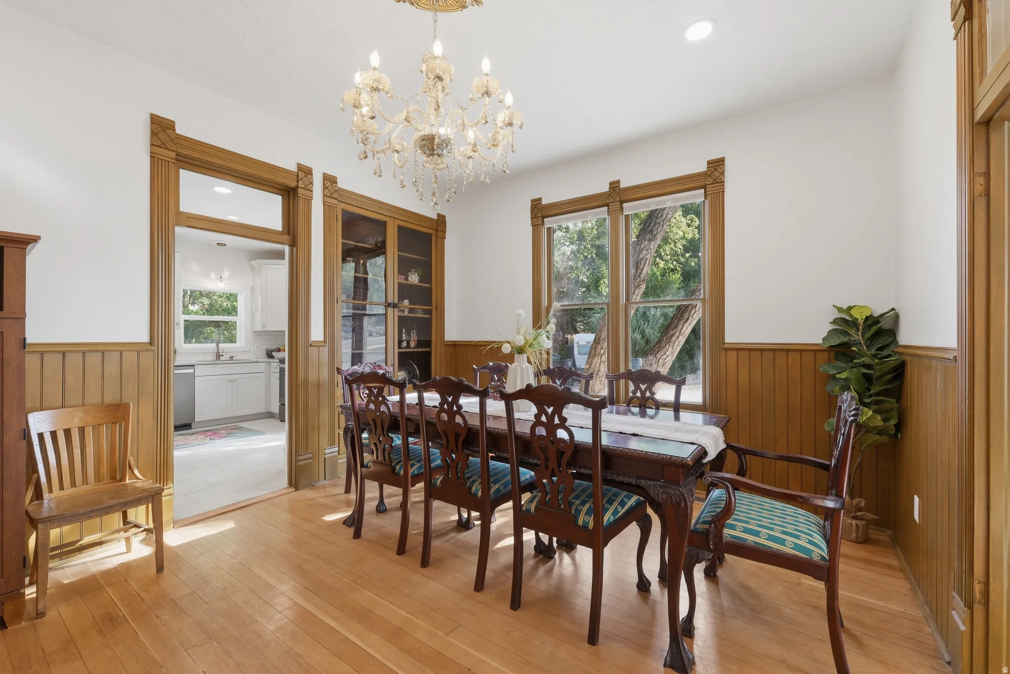 Hardwood flooring with wood paneling accents