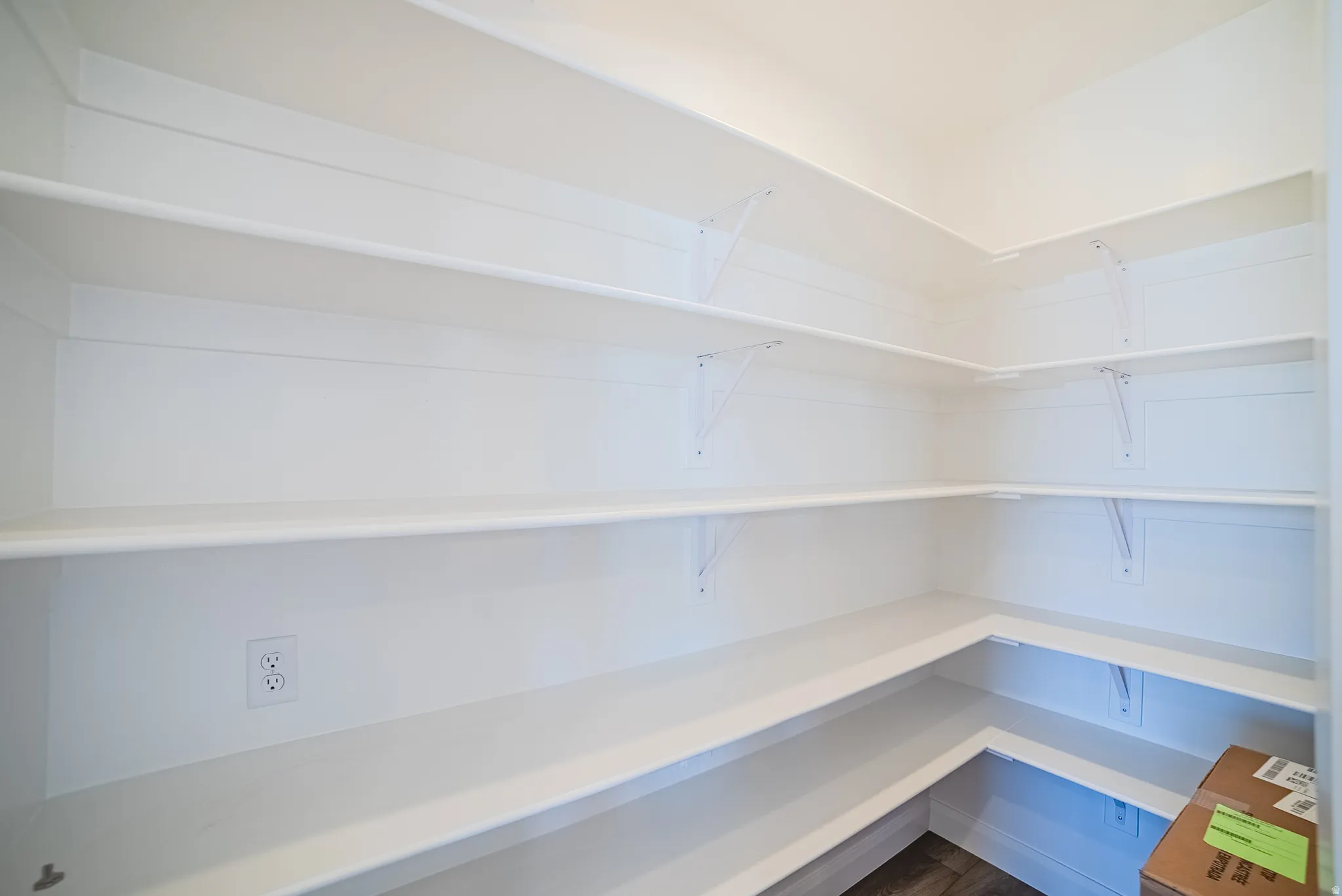 Wraparound shelving with white finish