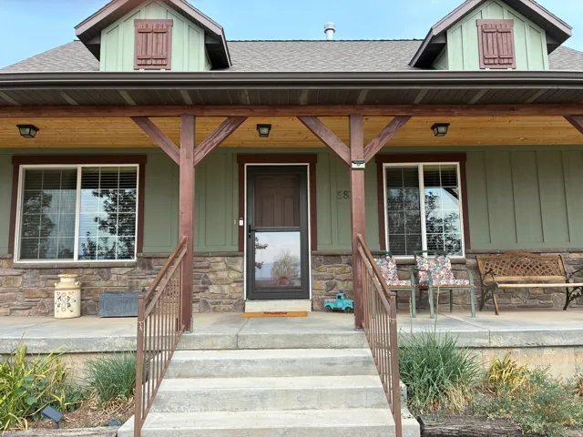 Stone facade with horizontal siding