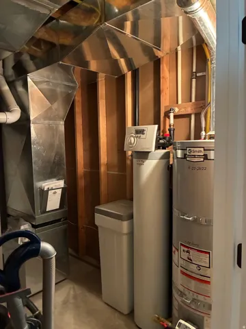 High-efficiency furnace and water conditioner