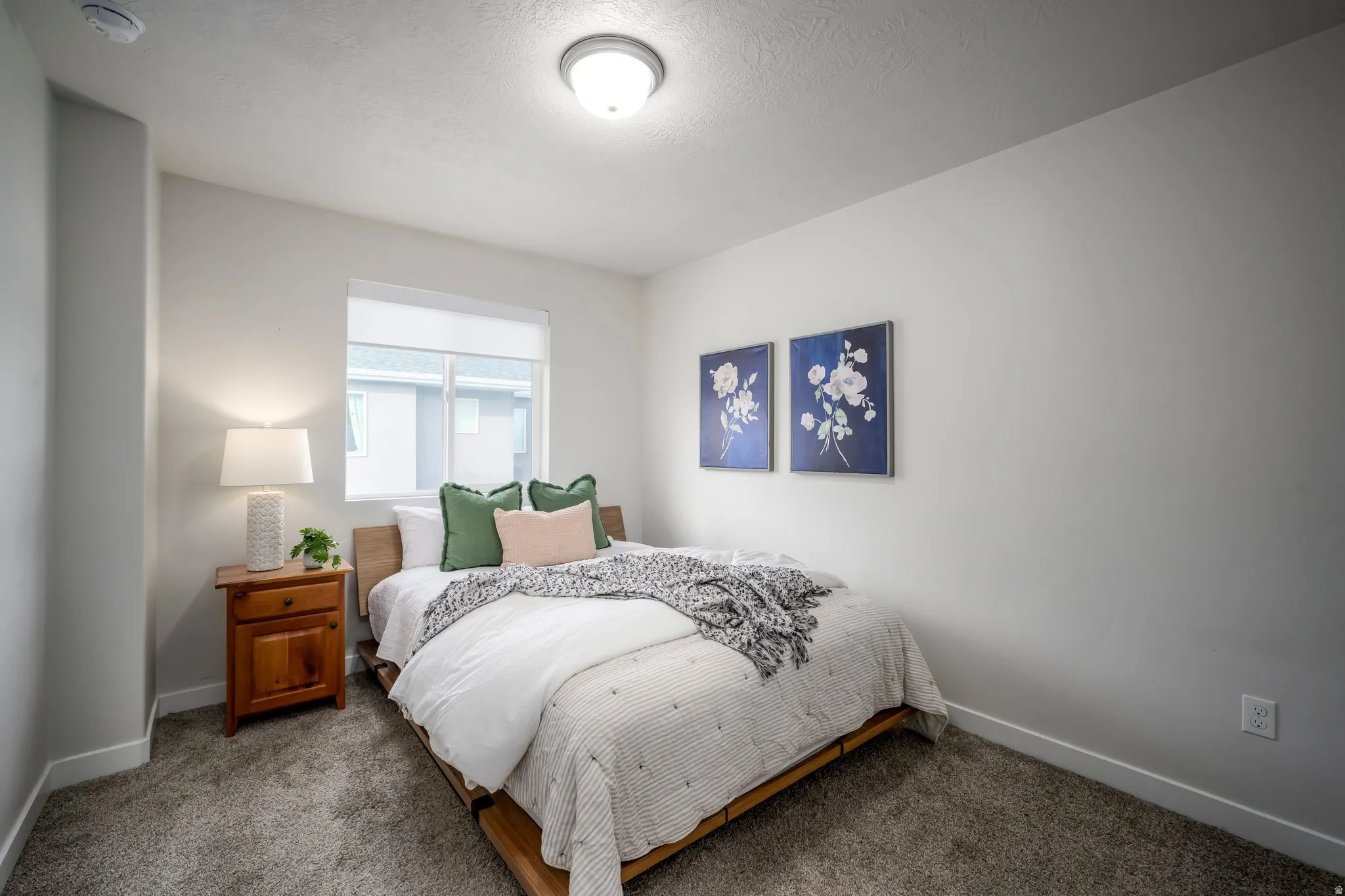 Bright secondary bedroom with tons of natural light.
