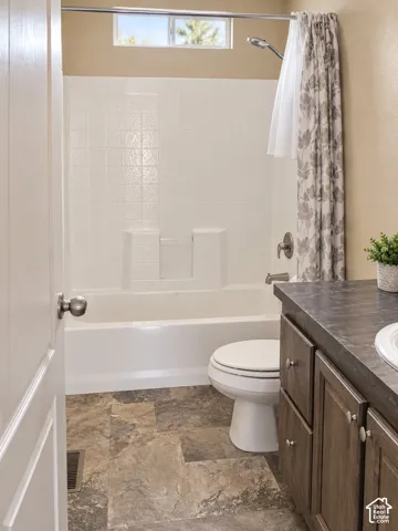 White tub and shower combination with tile-look surround