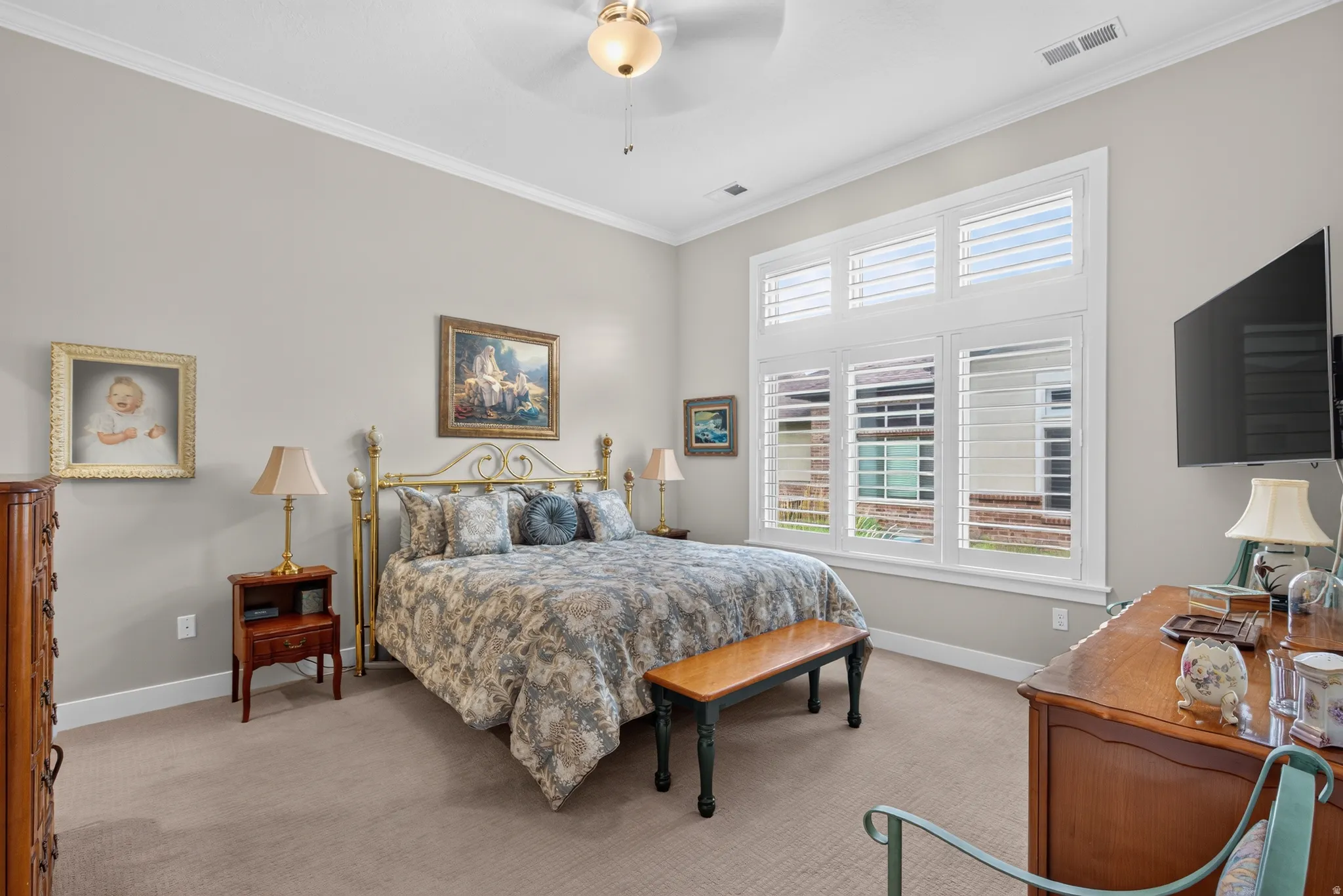 Spacious primary bedroom with separate walk in closet and primary bathroom