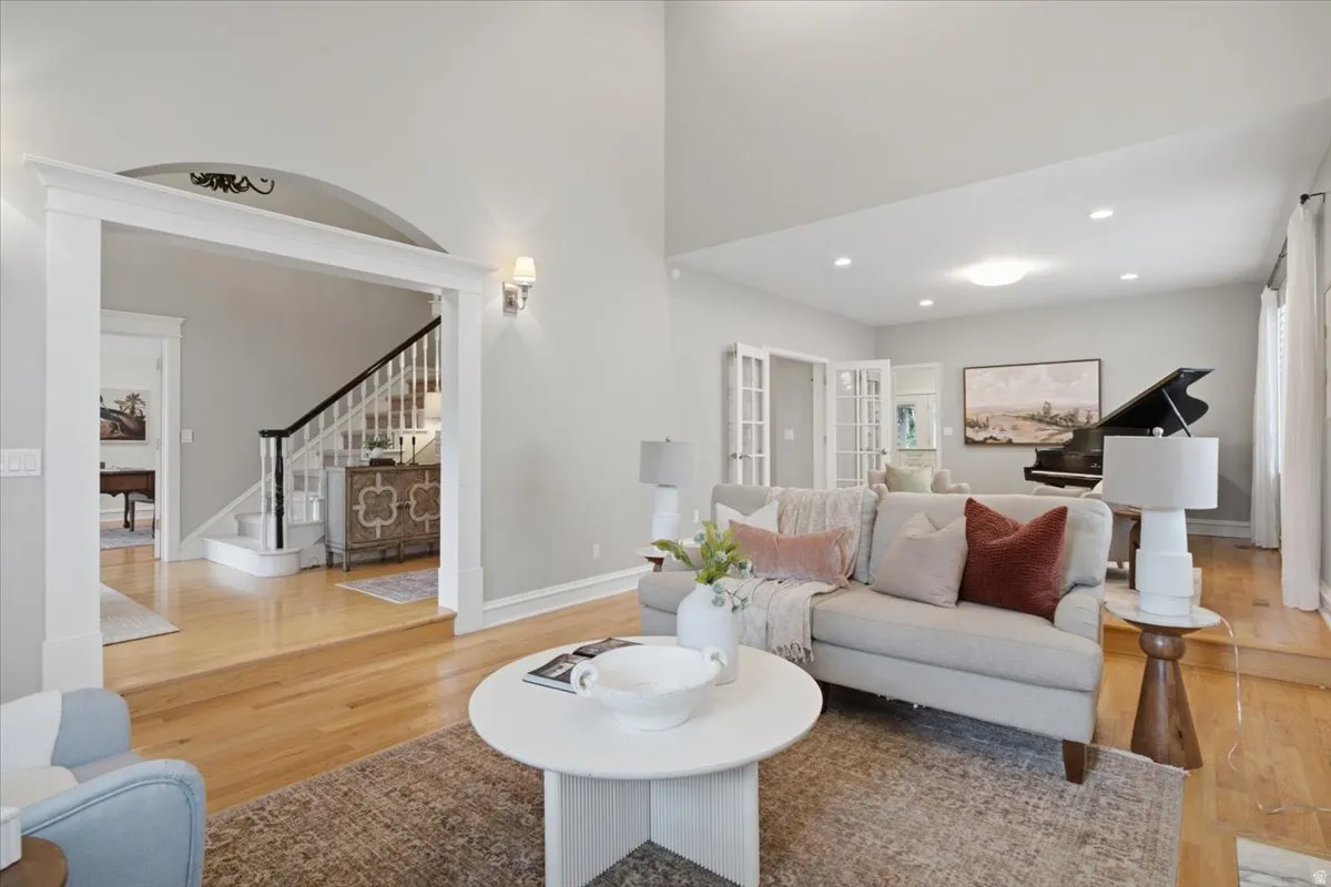 High ceilings, archway entry, and hardwood flooring throughout