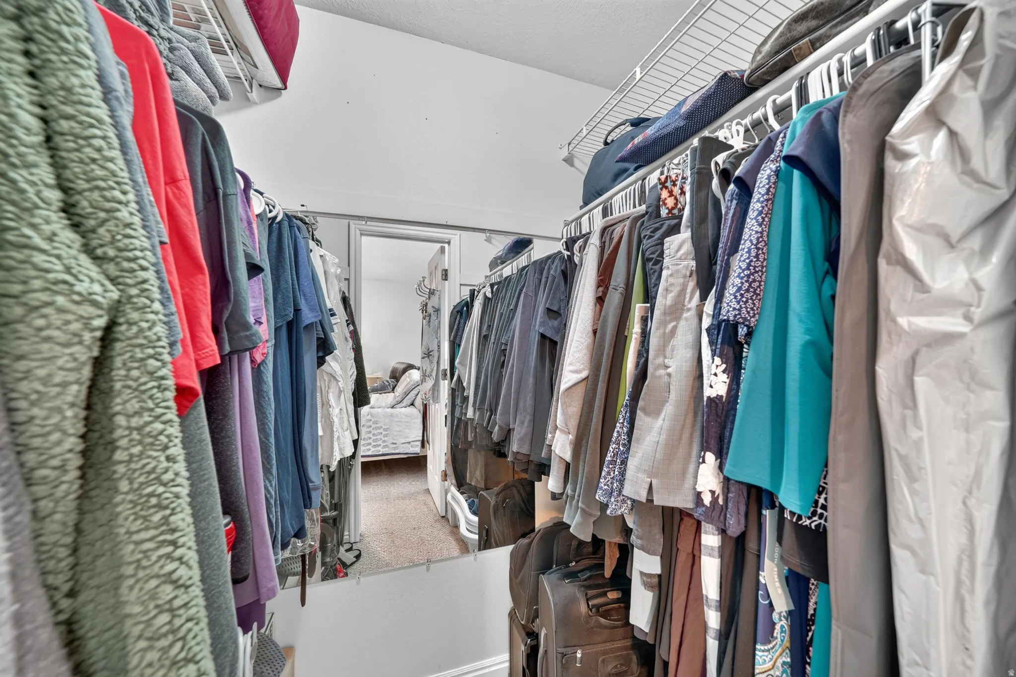 Primary Bedroom walk in closet