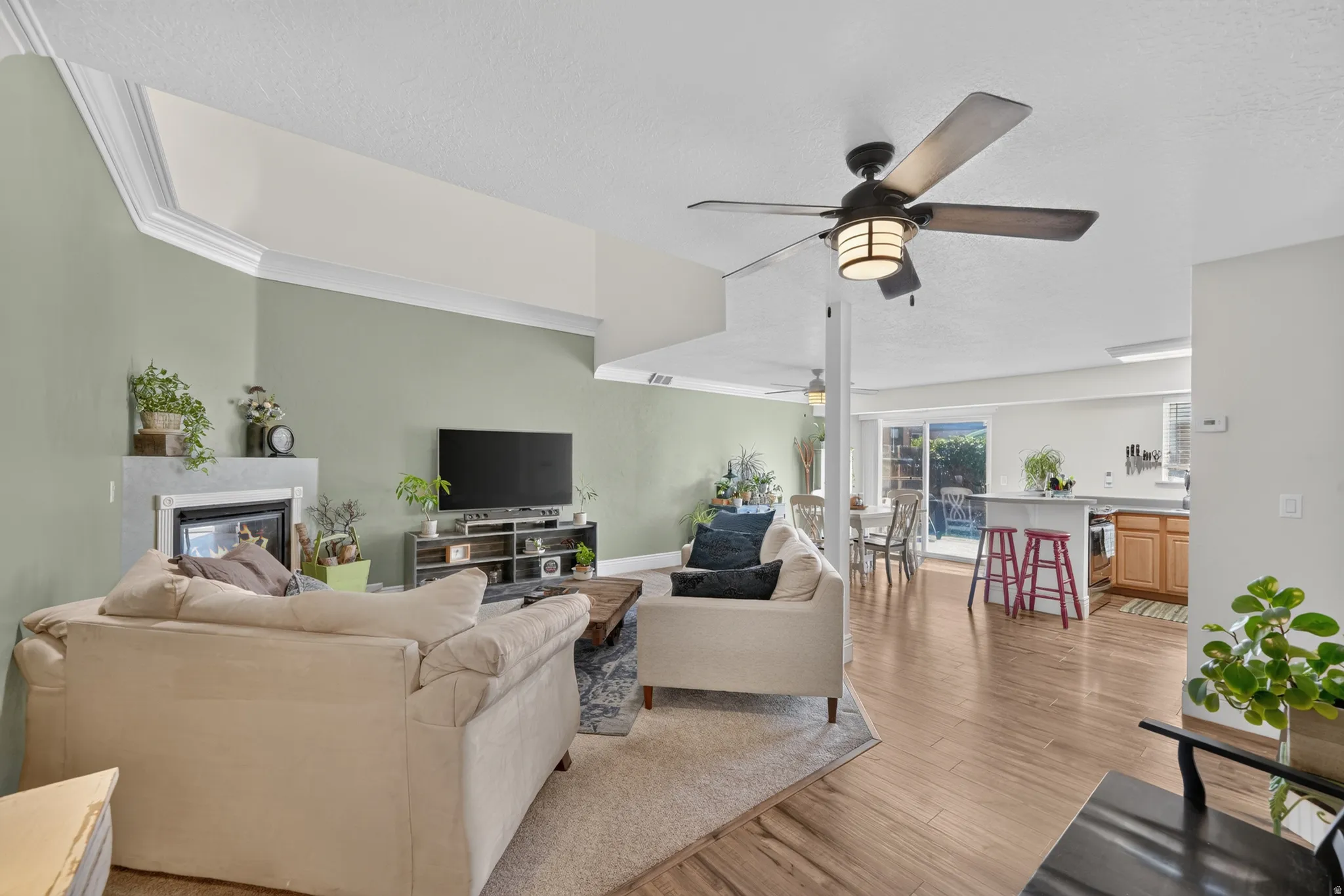 Family Room with vaulted, open ceiling and gas fireplace