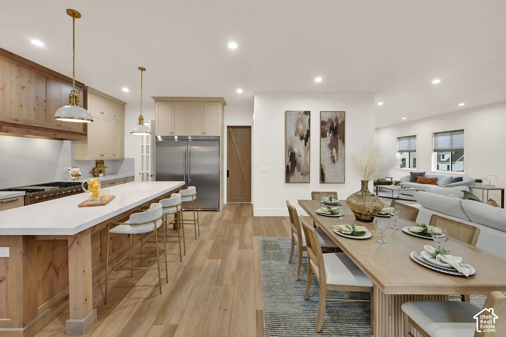 Open-concept living space with wood-finish flooring