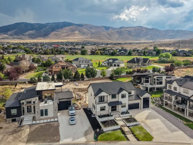 Stunning modern estate set on expansive grounds with panoramic mountain backdrop
