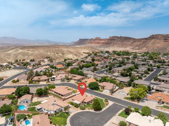 Residential neighborhood featuring single-story homes and mature landscaping