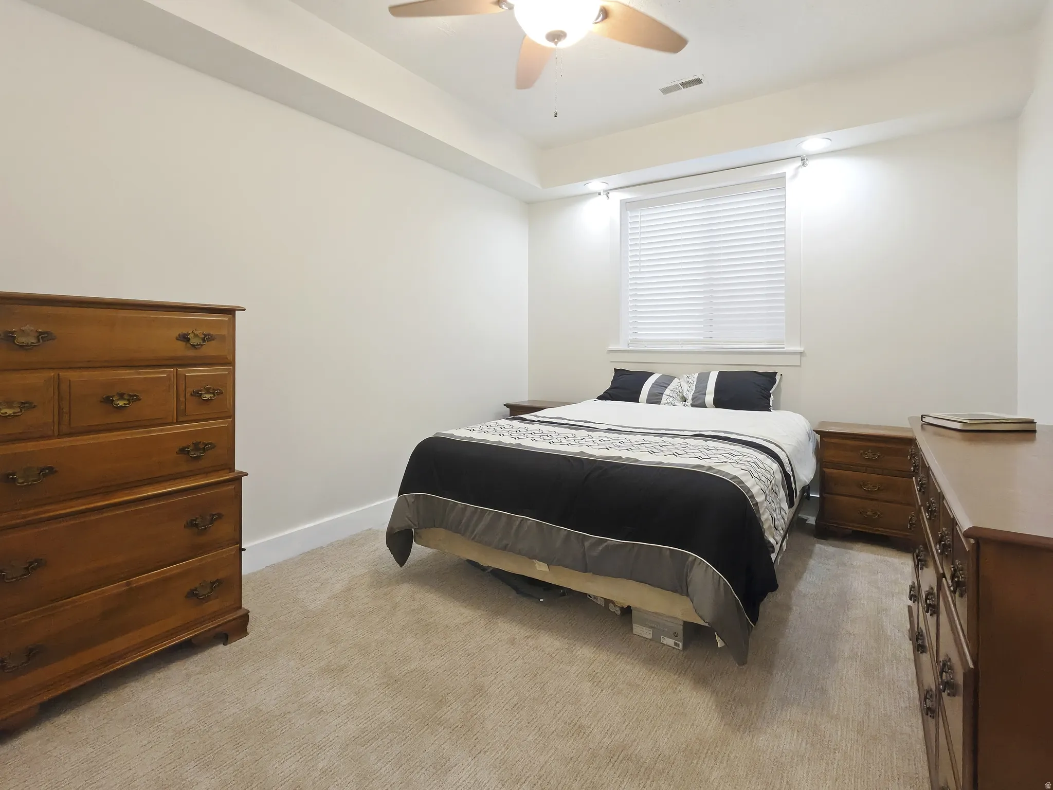 Recessed lighting, ceiling fan, window with blinds, and neutral carpet flooring