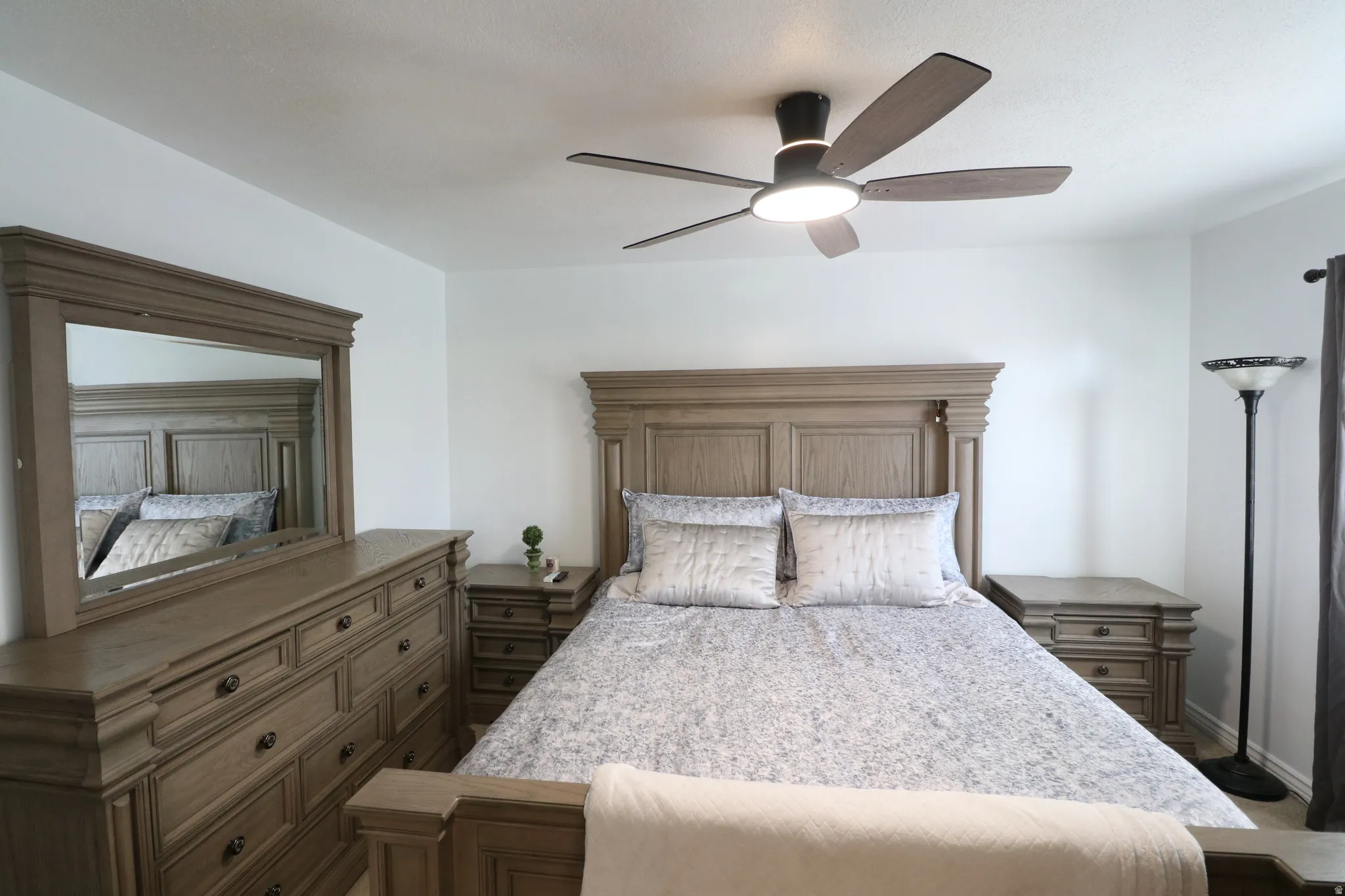 Recessed ceiling light with a modern ceiling fan