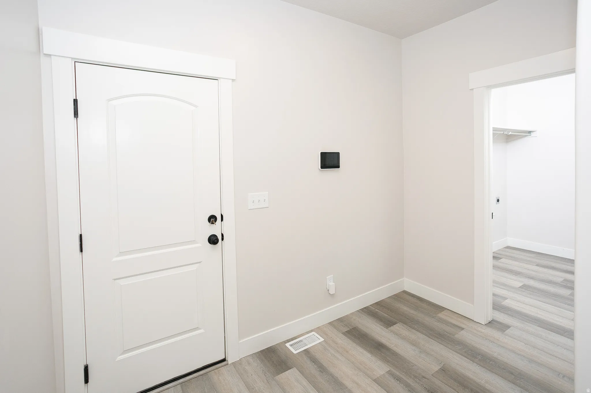 White interior door with black hardware