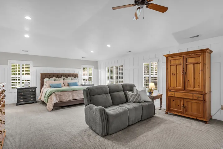 Master Bedroom (Upstairs)- Vaulted ceiling with recessed lighting and ceiling fan
