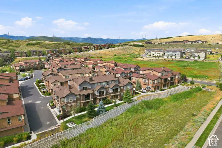 Community of multi-level residences with varied exterior finishes
