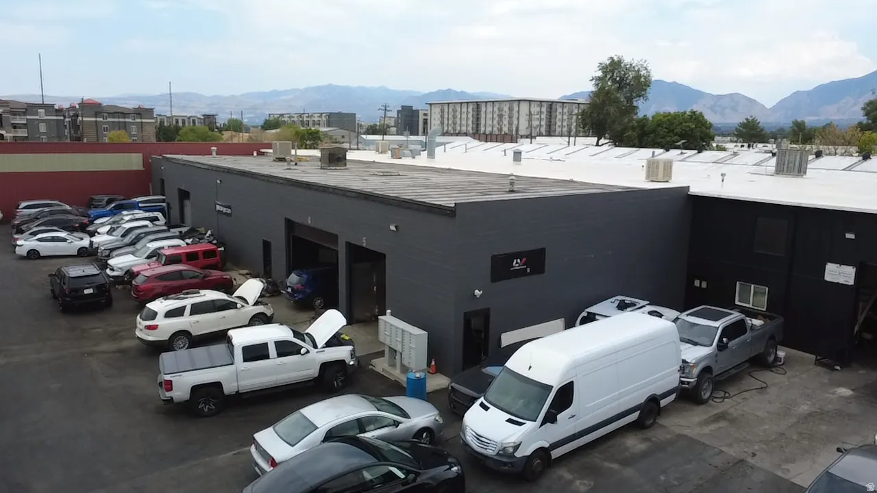 Commercial building with a dark-toned exterior and a flat roof