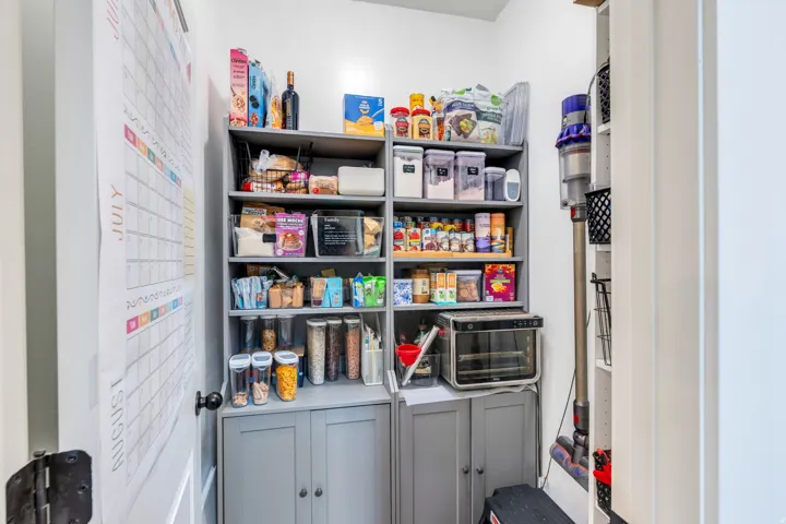 Built-in shelving with lower cabinetry providing organized storage