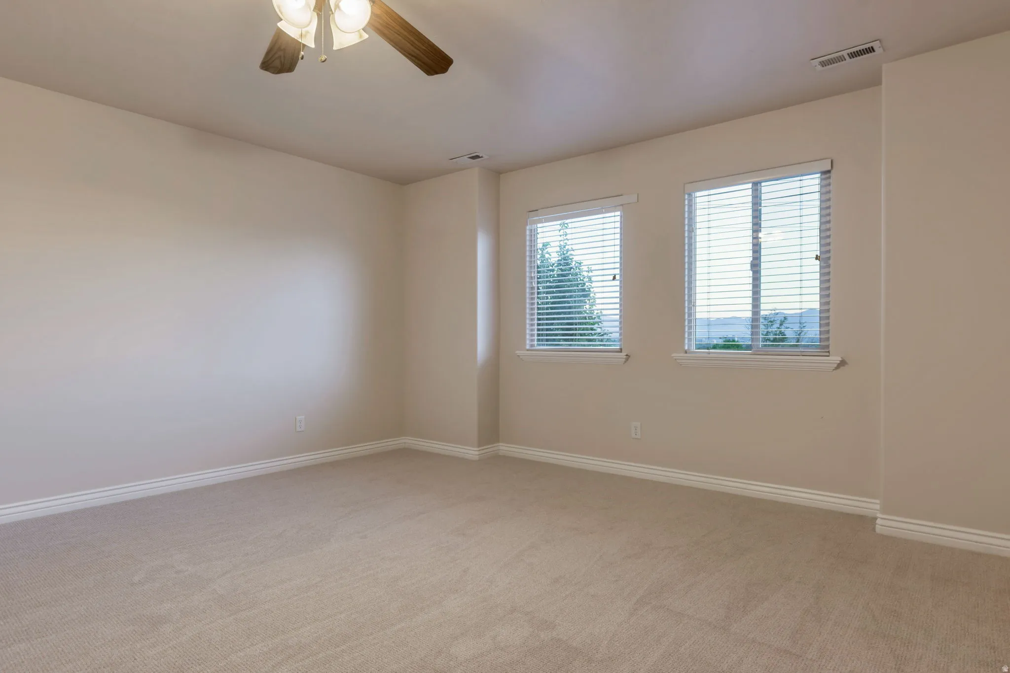 Neutral-toned carpeting and walls