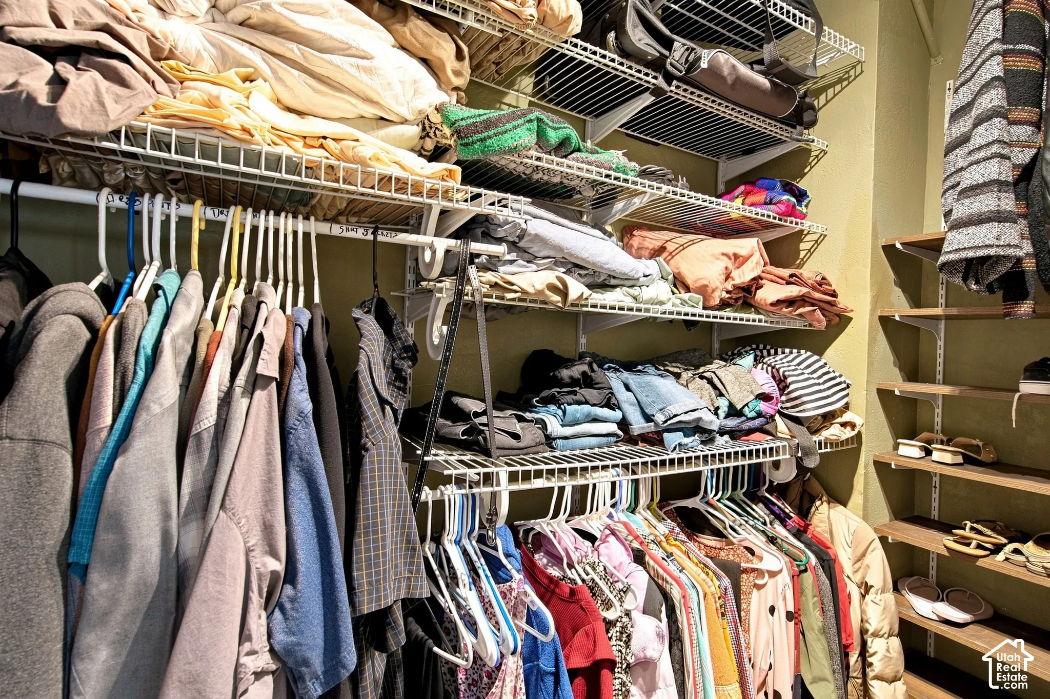 Walk in closet in primary bedroom
