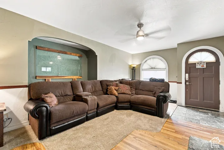 Living room with arched entertainment niche