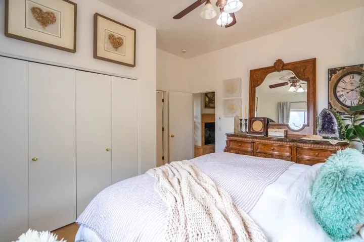 Recessed lighting, ceiling fan with integrated light fixture, bi-fold closet doors, and light-toned walls