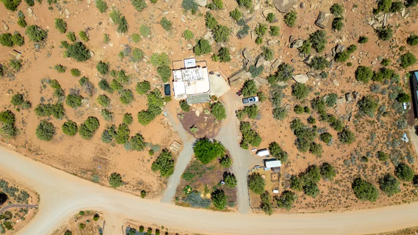 Extensive desert acreage with natural rock formations and diverse native shrubs