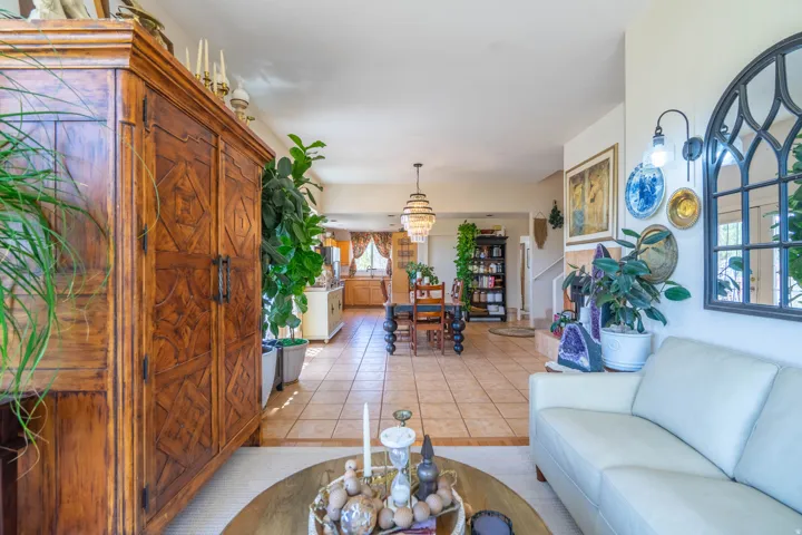 Expansive tiled flooring throughout, offering a cohesive aesthetic