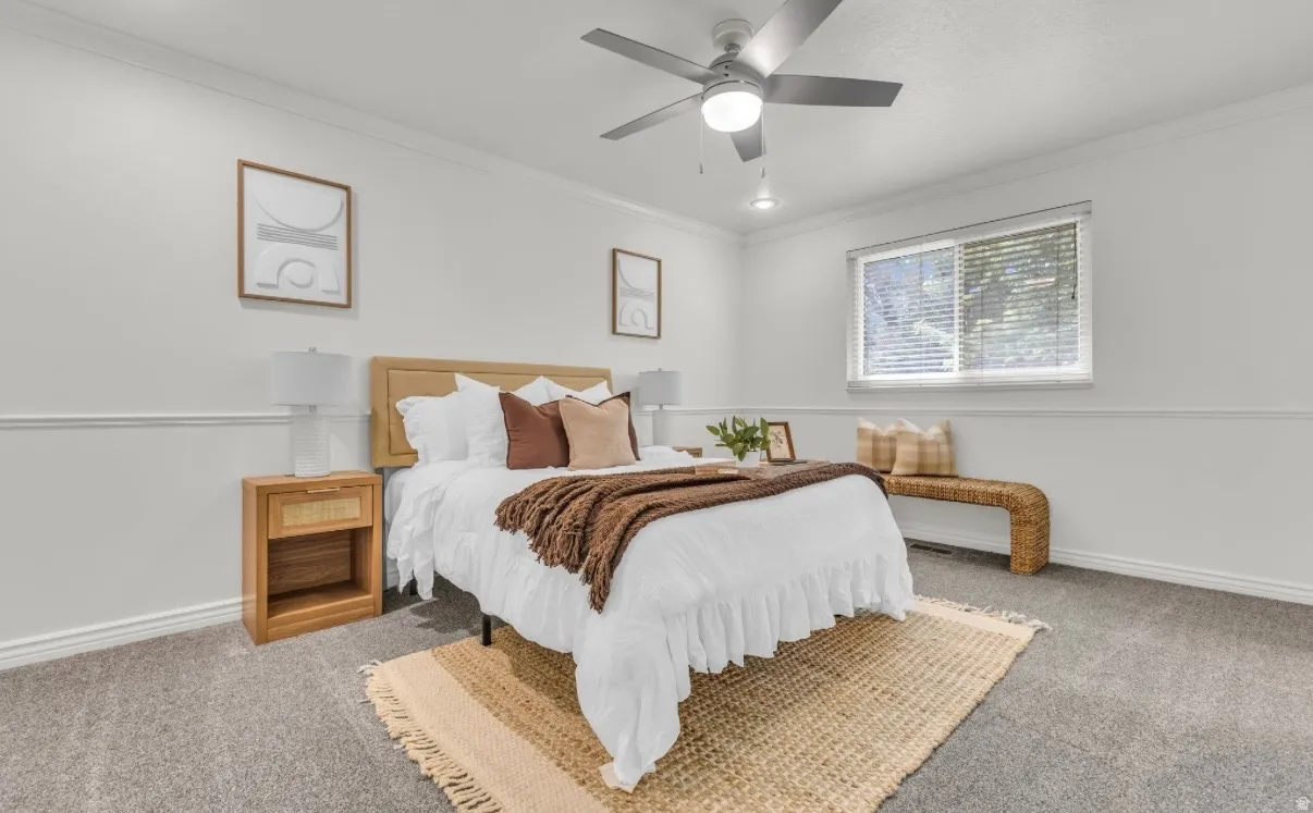 Recessed lighting, crown molding, a ceiling fan with light, and a window with blinds