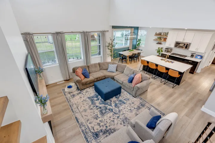 High ceilings with wood-finish flooring throughout